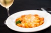 Cappelletti - Stuffed with ricotta, mozzarella and Romano cheese, and baked in a rosé sauce.